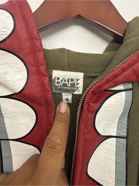 Bape Kaws Olive Green Hoodie Sweater with Red Shark-Print Trim